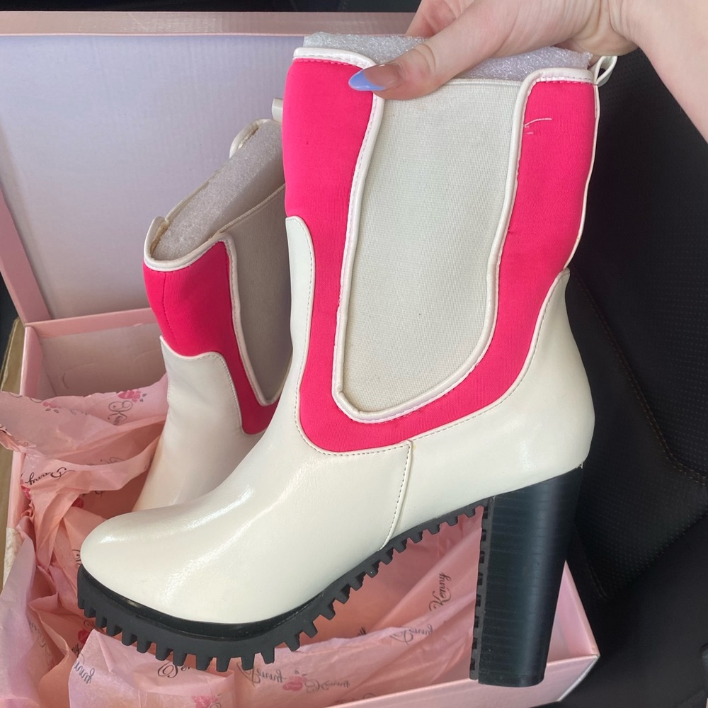 Selling brand new white and pink boots bought two bc of time concern, never worn